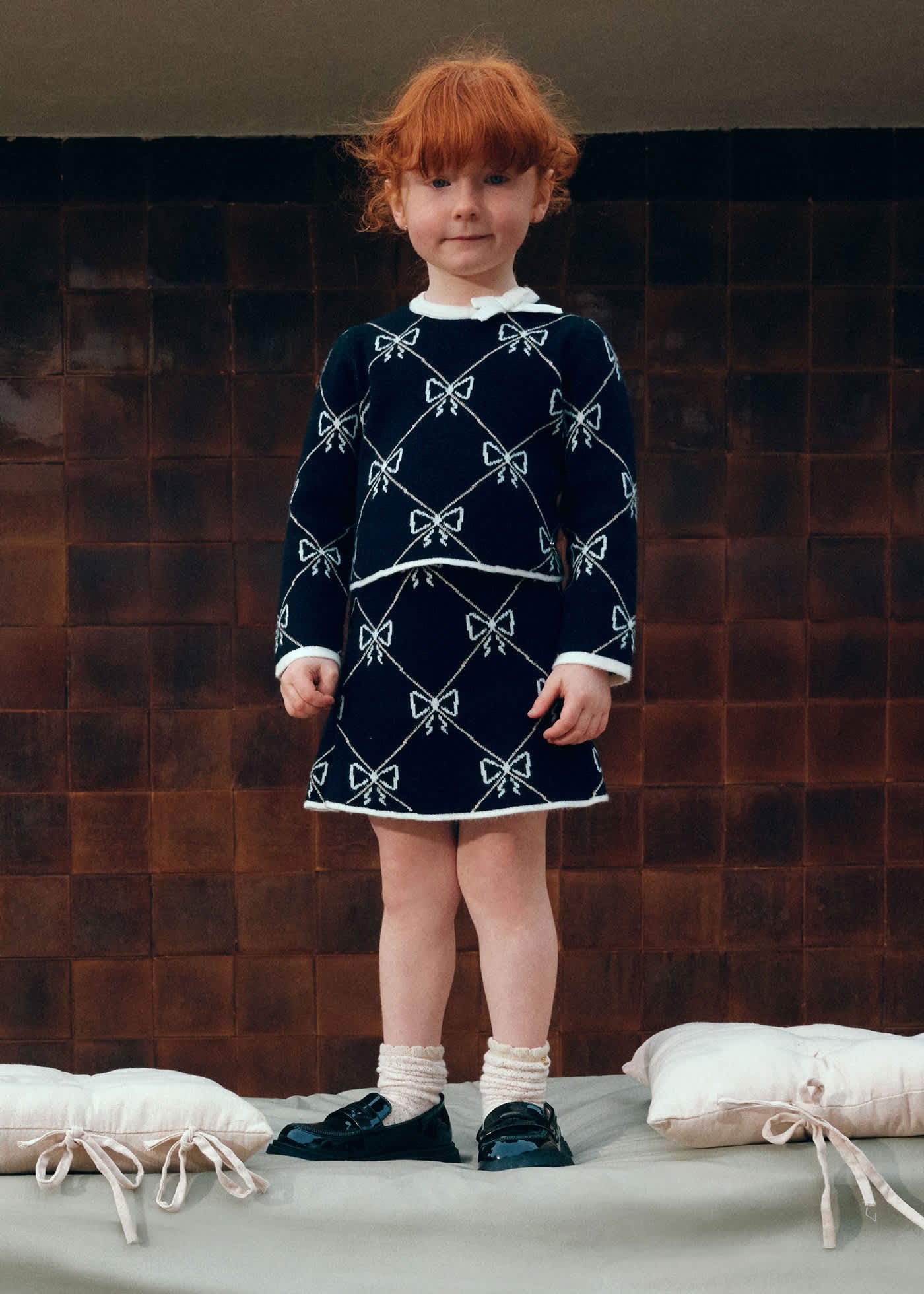 Conjunto Suéter Falda Moños