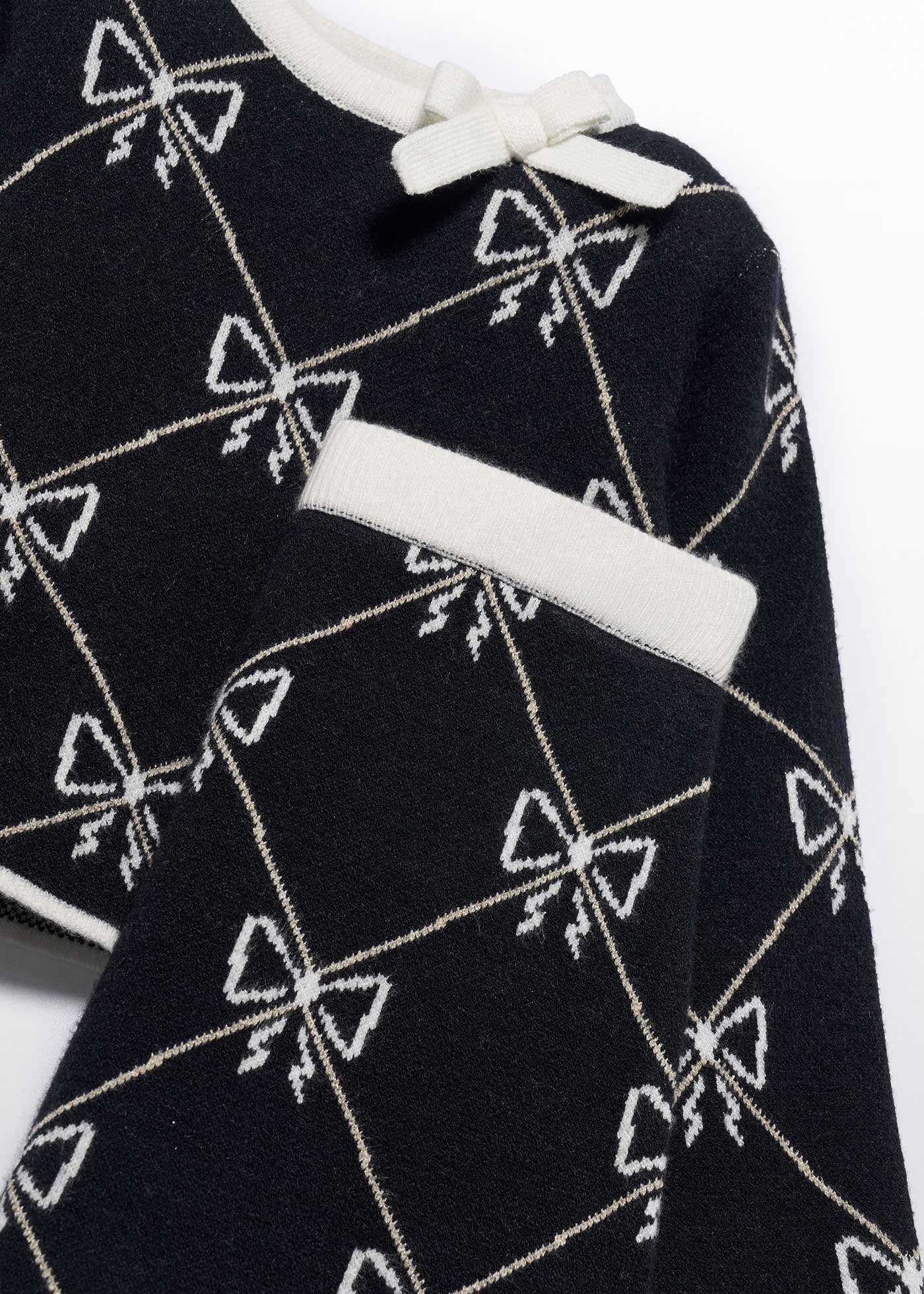 Conjunto Suéter Falda Moños