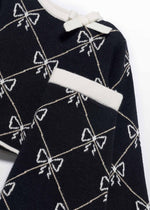 Cargar imagen en el visor de la galería, Conjunto Suéter Falda Moños
